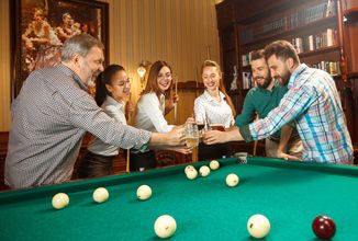 young-men-and-women-playing-billiards-at-office.jpg